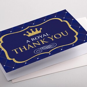 May include: A royal blue thank you card with a gold glitter crown and the text "A Royal Thank You".
