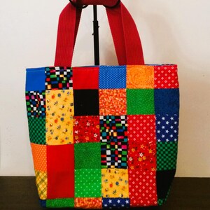 May include: A white ceramic mug with a black handle and the text "But First, Coffee" in a handwritten style. The mug is on a white surface. The mug is 4 inches tall.