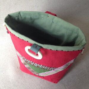 Small empty pocket decorative pocket in cherry red linen. image 3