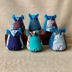 Little owls with lavender scents in the blues. image 1