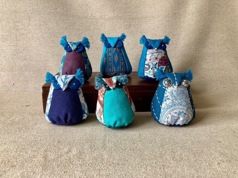 Little owls with lavender scents in the blues. image 1