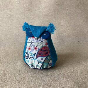 Little owls with lavender scents in the blues. turquoise/cachemire