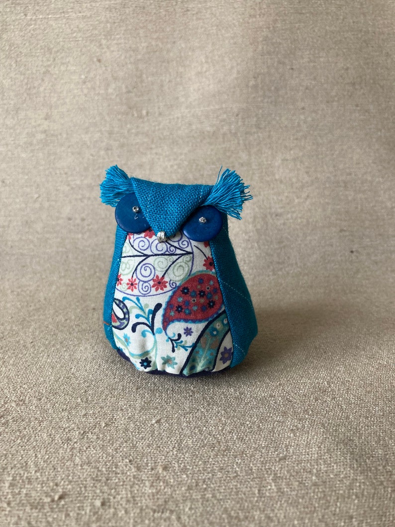 Little owls with lavender scents in the blues. turquoise/cachemire