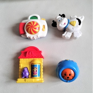 Set of 4 McDonald's Fisher price toys  from the 90'S