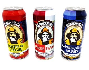 Lote de 3 latas de cerveza vacías de Pit Caribou Percé en Gaspésie, Quebec, Canadá. Microcervecería.