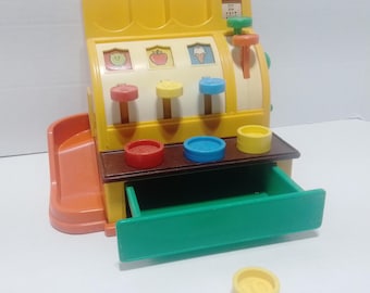 Caja registradora vintage Fisher Price 1974 con 4 monedas originales Play amarillas n.° 72044