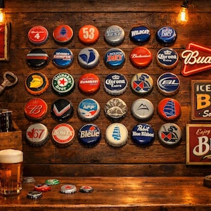 May include: A collection of thirty colourful metal beer bottle caps arranged in a grid on a dark wooden wall, accompanied by vintage-style signs for Coca-Cola, Budweiser, and Blatz, two glass mugs of beer, and a wooden crate labelled Bières Export.