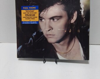 Paul Young - The Secret Of Association - Vinyl LP Record - 1985 New, never played with plastic cover and promotional sticker