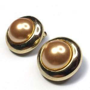 Bronze tone faux pearl & gold plated clip on earrings marked AMERIK, vintage