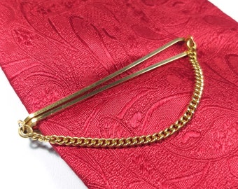 Vintage gold tone tie clip with chain