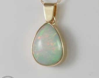 Ethiopian Opal Bezel Set in 18 kt Solid Gold - 1247