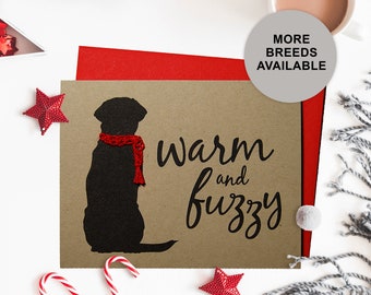 May include: A brown card with a black silhouette of a dog wearing a red scarf. The text "warm and fuzzy" is written in black on the card.