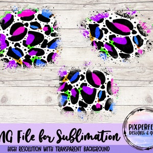 May include: Three digital clipart images of a white and black leopard print with bright pink, blue, green, and yellow paint splatters.  The images are on a white wood background.  PNG File for Sublimation. High Resolution with Transparent Background.