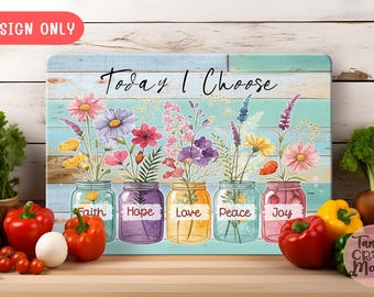 May include: A wooden cutting board with a blue and white background featuring a floral design with six mason jars. The jars are labeled with the words "Faith", "Hope", "Love", "Peace", and "Joy". The text "Today I Choose" is written in black at the top of the board.