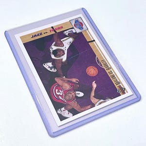 1991 Karl Malone Upper Deck 31 Malone kontra Barkley Klasyczna konfrontacja Utah Jazz NBA Koszykarz Karta kolekcjonerska