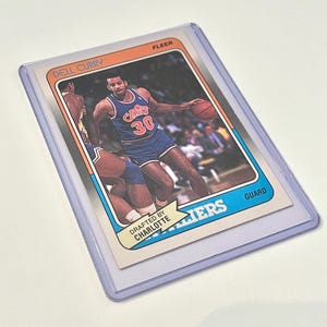 Tarjeta coleccionable del jugador de baloncesto de la NBA Dell Curry Rookie Fleer 14 de 132 del Draft de los Cleveland Cavaliers de los Charlotte Hornets
