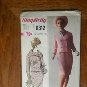 May include: A Simplicity sewing pattern envelope 6312 for a Miss size 12, bust 32. The cover features illustrations of a two-piece suit with a double-breasted jacket and skirt, including a pink version and a textured multi-colored version.