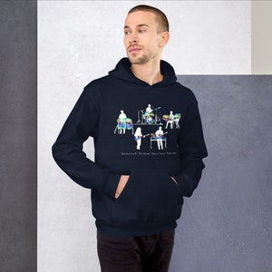 May include: A navy blue hoodie with a white silhouette of a band playing instruments. The instruments are filled with colorful abstract designs. The text "Sound Tribe Sector Nine" is printed below the band.