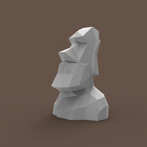 May include: A white, geometric, 3D model of a moai statue head. The model is made of triangles and has a simple, minimalist design.