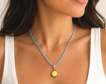 Vintage amber yellow amber pendant on blue cord - artisan necklace