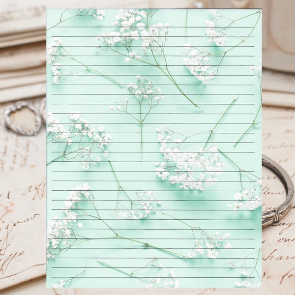 Blue/Green Floral Background lined stationery 8.5"X11" 25 sheets and 10 color coordinated envelopes available.