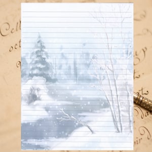 May include: A white lined paper with a winter scene printed on it. The scene features a snowy forest with a river running through it. The paper is perfect for writing letters or notes.