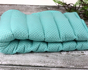 Reusable Rice Heating Pad. Microwave for Natural Heat Therapy or Freeze for Cooling Comfort. Providing Relaxation and Comfort.