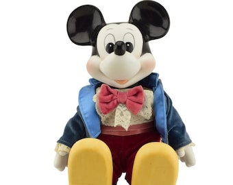 Mickey Mouse wind-up doll. Plays Mickey Mouse Club Theme Song. Made in Japan. Flaws (see below).