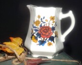 Almost antique (1920s) Arthur Wood 5496 hand-decorated Imari creamer milk jug. Cobalt, rust florals, gold edge, accents.