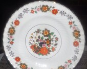 Mid-century Burgess Leigh dinner plate. Rust and blue Chinoiserie florals in urn. Burleigh Ware ironstone made in England.