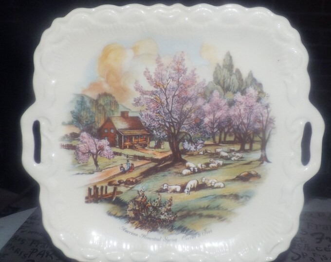 Vintage (attributed 1960s) Currier and Ives American Homestead Spring handled cake, cookie or pastry serving plate.