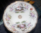 Antique (1852-1870) Meissen romance scene plate. Gold center medallion, Fragonard-style courting couple in period dress, filigree, flowers.