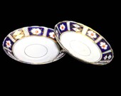 Pair of antique (1920s) Royal Stafford 3090 Imari orphan saucers only (no cups) made in England. Sold as pairs.