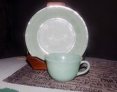 Mid-century (late 1940s - early 1950s) Fire King Jane Ray Jade Ite Jadeite glass cup and salad plate. Oven Ware line. Ribbed details.