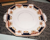 Almost antique (early 1920s) Royal Stafford Imari cobalt and gold, art-nouveau handled cake plate. Hand-painted marked 6068 to base.