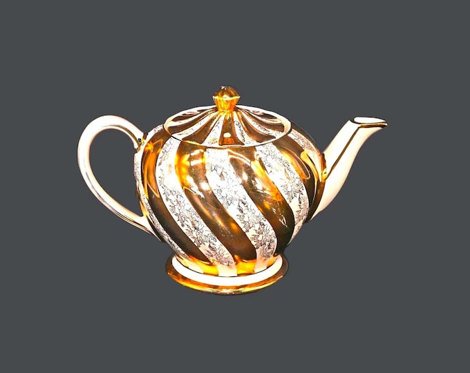 Sadler 1539 gold swirl four-cup teapot made in England. Flaws (see below).