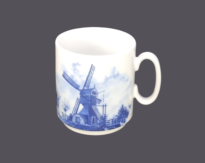 Delft Blauw hand-painted coffee or tea cup only made in Holland. Classic blue-and-white Delft windmill scene.