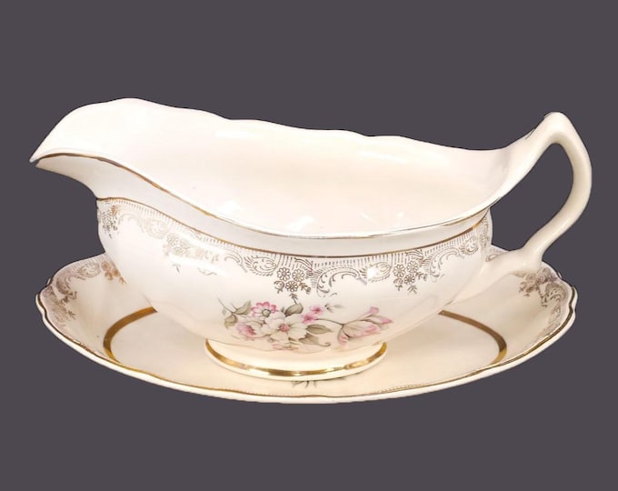 Sovereign Potters Windsor gravy boat with under-plate. Flaws (see below).