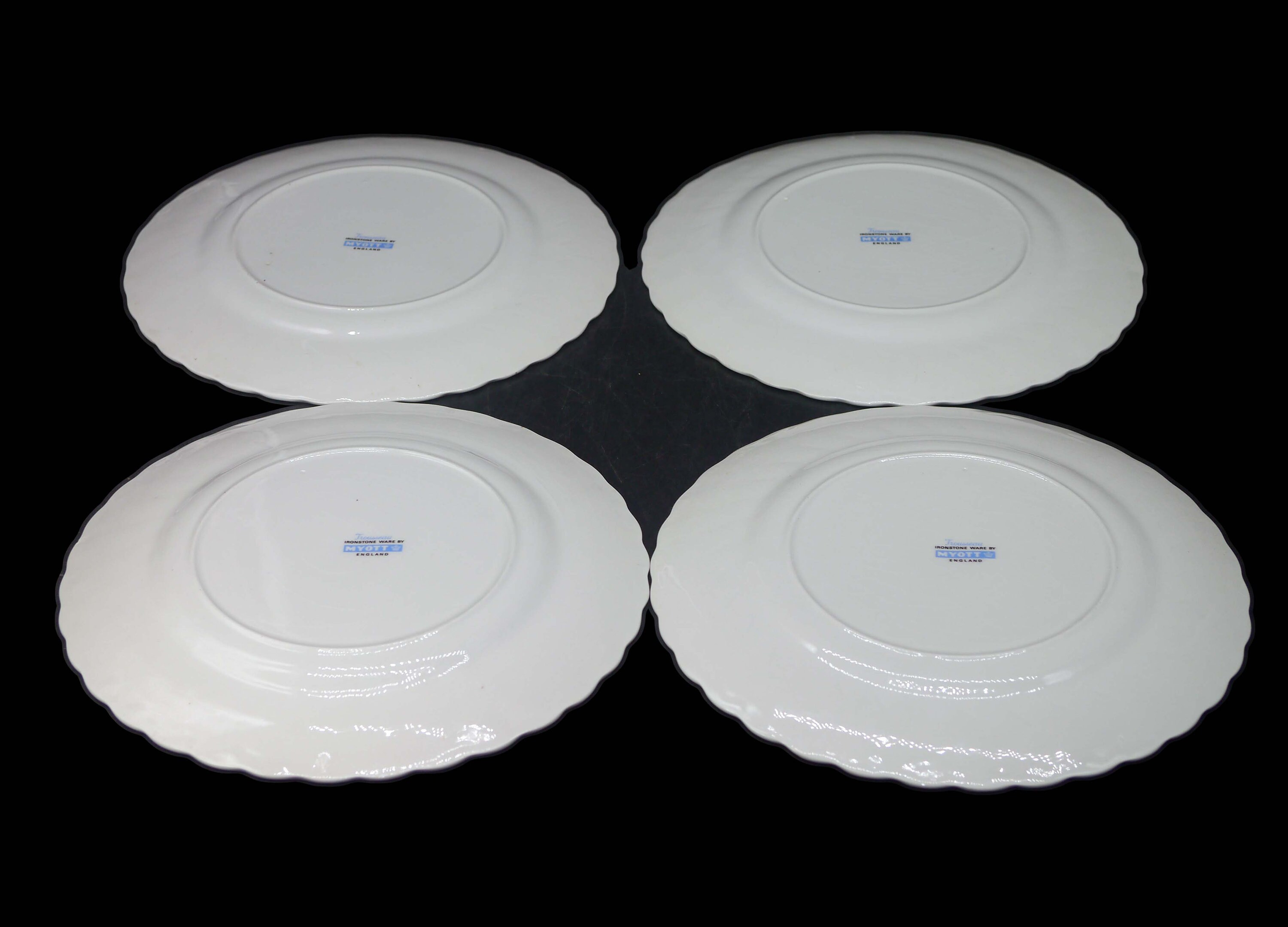 Four Myott Trousseau dinner plates made in England.