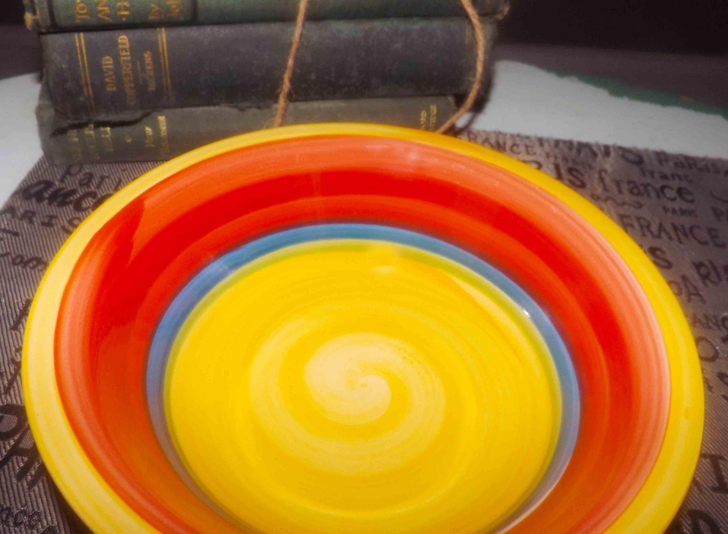 Vintage (1980s) Royal Norfolk Mambo rimmed cereal bowl. Bold red, orange, blue, green and yellow