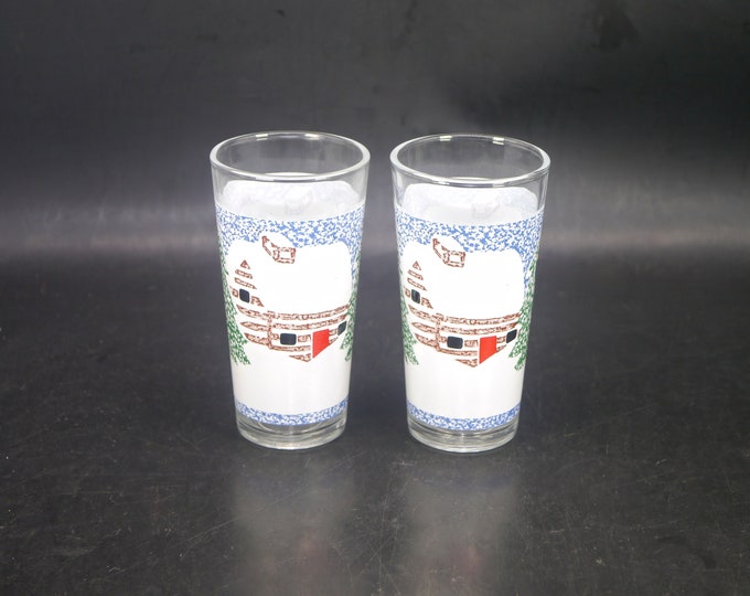 Pair of KIG Christmas Winter Scene Log Cabin in the Snow etched tumbler glasses. Christmas glassware made in Indonesia.