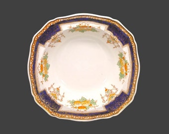 Royal Victoria ROV13 rimmed cereal bowl. Imari colors of cobalt, gold, orange and green. Made in England. Flaws (see below).