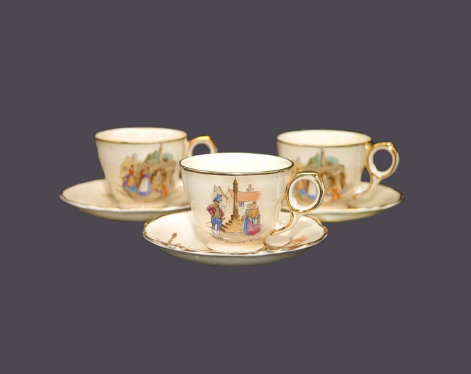 Three Royal Winton Grimwades Old English Markets demitasse cup and saucer sets made in England. Multi-motif market scenes