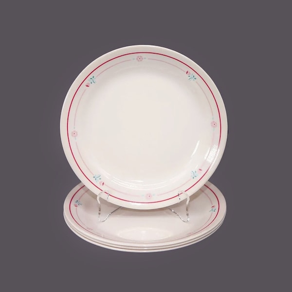 Four Corelle Corningware Cranberry Blossoms salad plates made in USA.