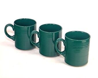 Three Signature Housewares Carnivale Dark Green stoneware coffee or tea mugs made in Japan.