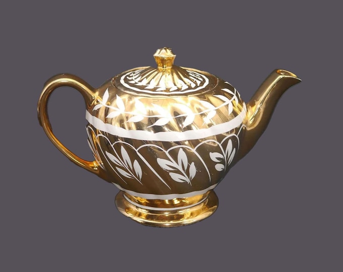 Sadler 1601R gold luster four-cup teapot made in England.
