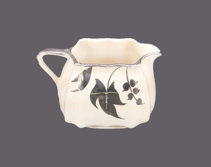 Lancaster Sandland 696 silver lusterware creamer jug made in England. Flaw (see below).