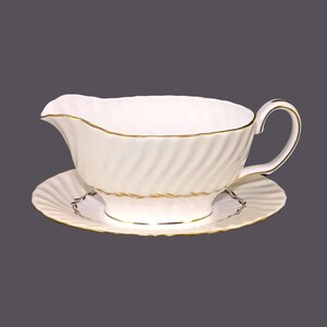 Minton S-520 Lady Devonish gravy boat with attached under-plate. Bone china made in England.