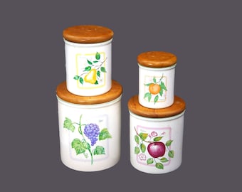 Four Himark Botanical fruit-themed canisters made in Taiwan.