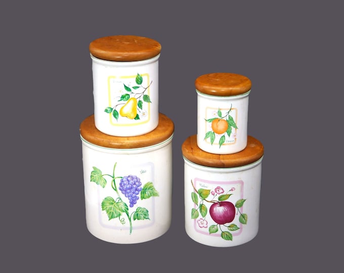 Four Himark Botanical fruit and herb themed canisters made in Taiwan.